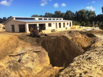  Filling in the 'pit' that was used for clean sand 