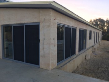  Next hole filling, wire brushing, floor scraping and sealing the walls - ready for the WINDOWS!  