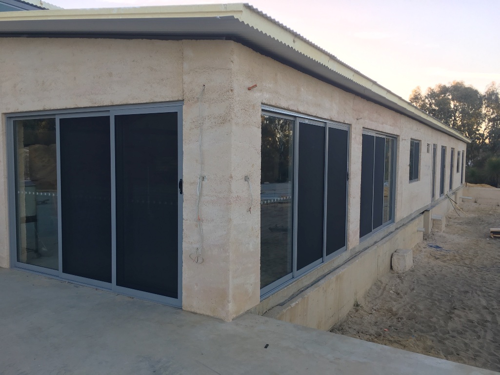  Next hole filling, wire brushing, floor scraping and sealing the walls - ready for the WINDOWS!  